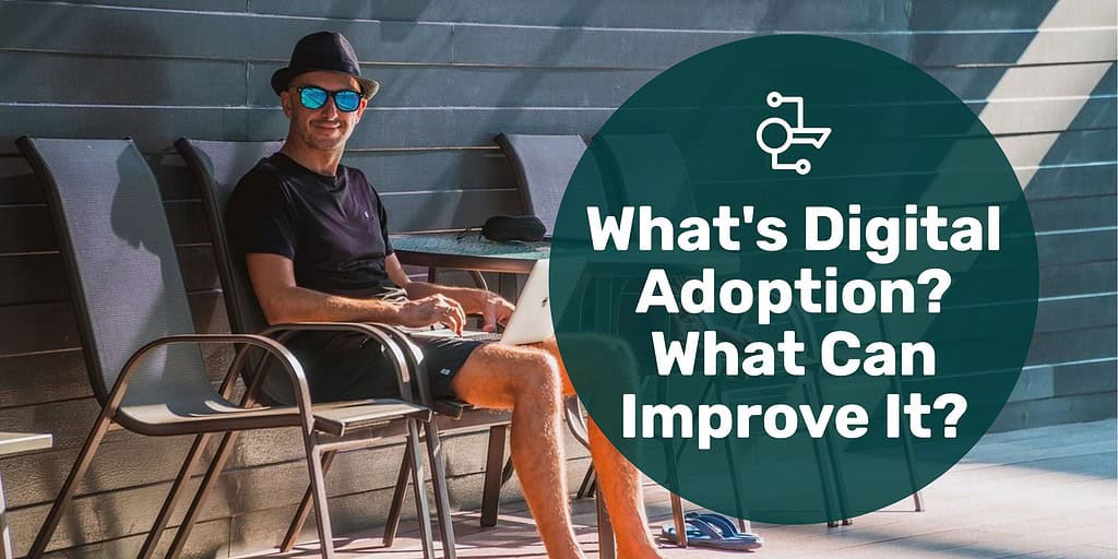 Man relaxing in chair on laptop smiling with text overlay "what's digital adoption? What can improve it?"